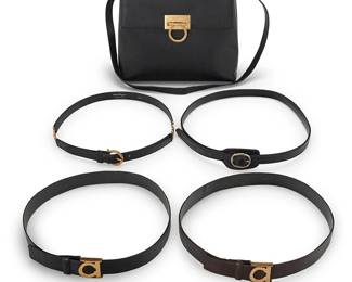 1167
Salvatore Ferragamo & Burberry: A Vintage Gancini Handbag and Four Leather Belts
Circa 1990s/2000s, Italy
Each variously marked for Ferragamo or Burberry; Made in Italy; bag: AF-21 0290
Comprising a black Gancini handbag in cross-hatched textured leather with top handle, gold-toned hardware, detachable shoulder strap and branded lining, together with a group of leather belts, including three Ferragamo belts, two black and one brown, each with gold-toned hardware, and a black leather Burberry belt with silver-toned buckle
5 pieces

Bag: 8 1/4 x 10 1/2 x 4 1/2 in.; handle drop: 4 1/2 in.; strap drop: 18 in.
Belts: Ferragamo: each 33 in. L; two: size 75; Burberry: 40 1/2 in. L; size 36/90
Estimate: $300 - $500