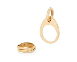 1003
Two Gold Rings Including Cartier
Including an 18k tri-color gold trinity Cartier band, signed Cartier no. 43, together with a 12k gold ring featuring a moveable gold link
2 pieces

Size: 2 and 4
11.6 grams gross
Estimate: $600 - $800