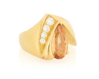1129
An 18K Gold, Topaz and Diamond Ring
Featuring a pear-shaped topaz measuring approximately 13.10 x 7.72 x 4.74 mm, accented by four graduated round diamonds

Size: 5
11.4 grams
Estimate: $600 - $800