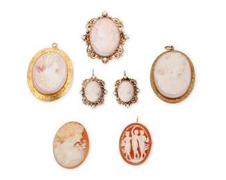 1092
A Group of Gold and Shell Cameo Jewelry
Including two 10k gold and two 14k gold brooches, a pair of 14k gold earrings and a loose shell cameo
7 pieces

Brooches: 1 1/2 - 1 3/4 in., Earrings: 1 in.
56.1 grams gross
Estimate: $300 - $500