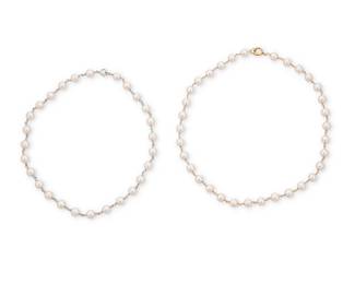 1049
Two 14K Gold, Platinum and Cultured Pearl Necklaces
Each of a single strand design featuring cultured pearls measuring approximately 7.10-7.34 mm, finished with 14k gold and platinum finishes
2 pieces

Lengths: 15 in. and 16 in.
43.3 grams gross
Estimate: $800 - $1,200