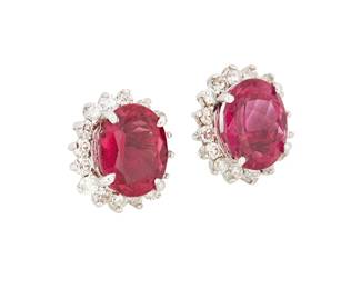 1017
A Pair of 14K White Gold, Rubellite Tourmaline and Diamond Earrings
Centering two oval rubellite tourmalines weighing approximately 3.50 carats each, encircled by round diamonds 0.96 carats total
2 pieces

Measures: 5/8 x 1/2 in.
6.0 grams gross
Estimate: $1,000 - $1,500