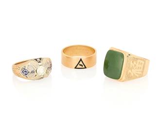 1059
Three Gold Rings
Including a 14k gold and black enamel Masonic ring, a 14k gold and nephrite jade tablet ring, and a 10k gold, blue enamel and cubic zirconia ring
3 pieces

Sizes: 9 1/4 - 11
24.7 grams gross
Estimate: $800 - $1,200