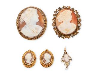 1093
A Group of Shell Cameo Jewelry
Comprising two brooches, including one in 10k gold, as well as a pair of 14k gold earrings, and a diminutive pendant
5 pieces

Brooches: 2 1/8 in. and 2 in.; Earrings: 1 in.; Pendant: 1 1/2 in.
48.2 grams gross
Estimate: $300 - $500