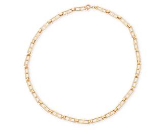 1056
A 14K Gold Chain
Of a fancy rectangular link design

Length: 18 in.
15.7 grams gross
Estimate: $700 - $900