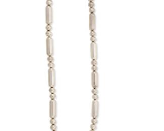 1173
A Long Sterling Bead Chain Necklace
A chunky necklace with alternating tubular silver beads and spherical beads, signed PH to hangtag and clasp

Length: 32 in.
154.1 grams
Estimate: $800 - $1,200