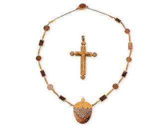 1072
A Gold and Fossilized Palm Wood Necklace and Gold Pendant
Including a 20k gold necklace featuring elements of fossilized palm wood together with a filigree style 15k gold cross pendant
2 pieces

Necklace: 19 in., Cross: 3 x 1 1/2 in.
27.1 grams gross
Estimate: $1,200 - $1,800
