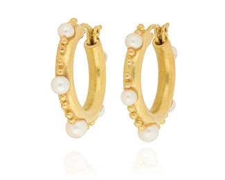 1050
A Pair of 18K Gold and Cultured Pearl Earrings
Of a hoop design, featuring ten cultured pearls accented by gold granulation
2 pieces

Measures: 1 x 1/8 in.
11.9 grams gross
Estimate: $800 - $1,200
