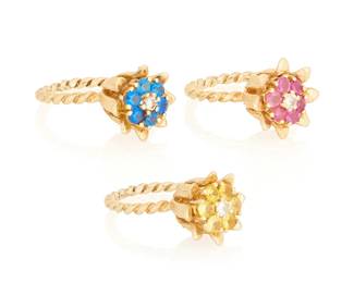 1103
Three 12K Gold and Gem-Set Rings
Of a floral design featuring rubies, blue and yellow stones
3 pieces

Size: 5
14.1 grams
Estimate: $700 - $1,000
