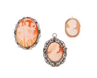 1107
A Group of Gold and Silver Shell Cameos
Including two silver framed shell cameos, one accented with faceted marcasite and one 14k gold framed shell cameo
3 pieces

Measures: 1 3/8 - 2 1/4 in.
37.4 grams gross
Estimate: $200 - $300