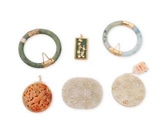 1043
A Group of Carved Hardstone Jewelry
Including a 14k gold and jade bracelet, a base metal and jade bangle, a base metal and green jade pendant, a 14k gold and red jade pendant together with two carved hardstone elements
6 pieces

Bangles: 7 and 7 1/2 in., Pendants: 2 1/4 in., 2 1/2 in. Carvings: 2 1/2 - 2 3/4 in.
195.8 grams gross
Estimate: $300 - $500