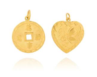 1005
Two 24K Gold Pendants
Including a floral heart-shaped design together with a disc shape including Chinese characters
2 pieces

Measures: 1 x 7/8 in. and 1 3/4 in.
8.7 grams
Estimate: $800 - $1,200