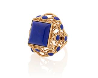 1063
A 14K Gold and Lapis Lazuli Ring
Centering a rectangular lapis lazuli cabochon accented by round lapis lazuli cabochons set in an ornate swirling design

Size: 5 1/2
10.8 grams gross
Estimate: $400 - $600