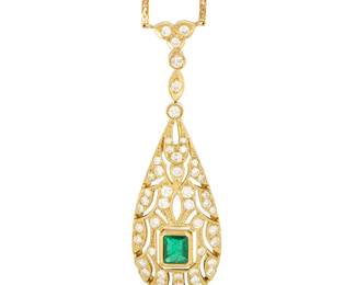 1130
A 14K Gold, Emerald and Diamond Necklace
Of a teardrop openwork design centering a cut-cornered rectangular step-cut emerald measuring approximately 5.87 x 4.75 mm, accented by round diamonds weighing approximately 1.75 carats

Chain: 16 in., Pendant: 2 1/4 x 3/4 in.
12.8 grams gross
Estimate: $1,000 - $2,000