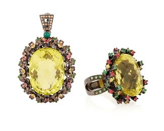 1074
A Blackened Silver, Lemon Quartz and Gem-Set Pendant and Ring Set
Featuring two large oval checkerboard-cut lemon quartz, accented by tsavorite and demantoid garnets, garnet and topaz
2 pieces

Ring: 8 1/4, Pendant/Brooch: 2 3/8 x 1 1/2 in.
50.6 grams gross
Estimate: $800 - $1,200
