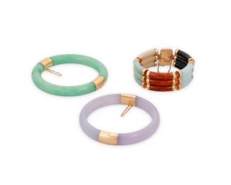 1037
A Group of Gold and Jade Bracelets
Including a lavender jade bangle, a green jade bangle and a multi-color jade segmented bracelet
3 pieces

Measures: 6 1/2 - 8 1/4 in.
196.6 grams gross
Estimate: $600 - $800