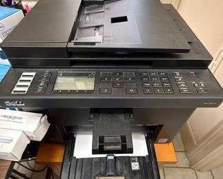 Dell Multifunction Printer Capable of Printing, Scanning, Copying, and Faxing.