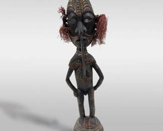 A Finely Carved Wooden Papua New Guinean Male Ancestral Standing Figure