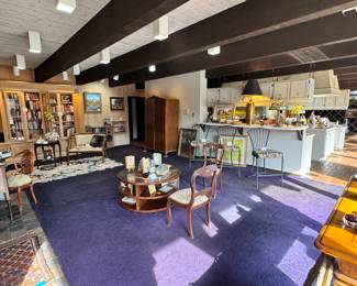 Family Room full of books, art and audio-visual