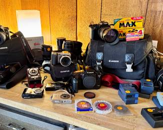 Camera Equipment. Canon, Olympus