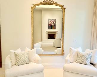 swivel  chairs and large stunning French mirror