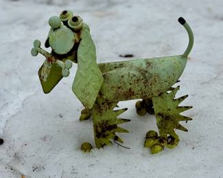 Dog with bone yard art