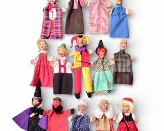 Vintage German hand puppets with wooden carved heads.