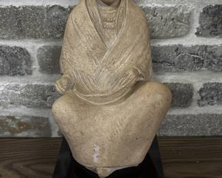 Stone-Look Sculpture of Seated Native American