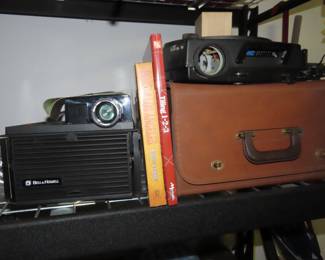 Slide projectors and case.