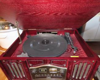 Record player/radio/cassette.