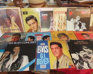 Large collection of Elvis LPs, 8 track cassettes, books, magazines, trading cards, memorabilia items.