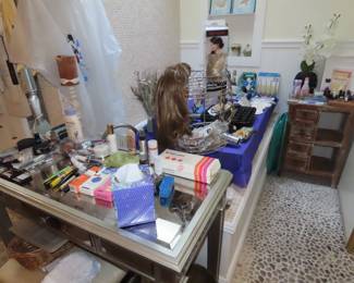 Hair pieces and wigs, personal grooming items.