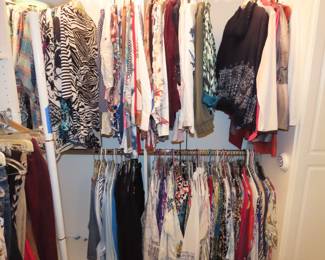 Three closets of Chicos clothing size 0, 00 and 1.