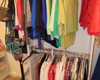 Three closets of Chicos clothing size 0, 00 and 1.