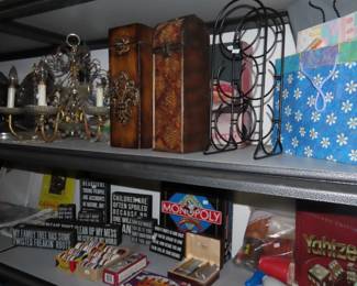 Games, signs, chandelier with crystals, wine storage.