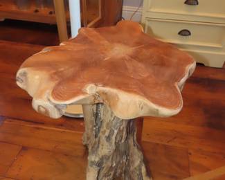 Carved wood end table.