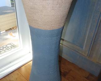 Rope covered plant stand.