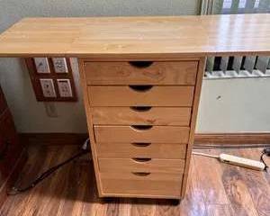 Lot 115  MultiDrawer Wooden Craft Table with Foldable Top Extension Filled w Misc. Items