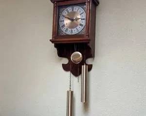 Lot 109  Vintage Battery Operated Wall Clock with Pendulum