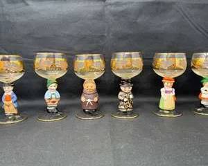 Lot 76  Vintage Decorative Glass Goblets with HandPainted Figurine Stems