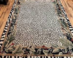 Lot 119  Animal Print Area Rug with Leaf Border Design