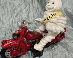 Cast Iron Michelin Man On Motorcycle 