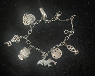  JAMES AVERY RETIRED CHARMS BRACELET  - RETIRED DOLPHIN  - HAPPY BIRTHDAY CAKE  CELL PHONE    AND MORE   $300 SOLD AS BRACELET ONLY   7 CHARMS  