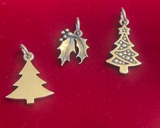 James Avery Christmas charms. Holly charm $89 *HOLLY SOLD **   Decorated tree flat $35  flat all sterling tree $39