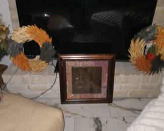 TV in front of fireplace