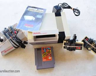 NES Console with NES Advantage Paddle, 2 standard Paddles, and Donkey Kong Classics