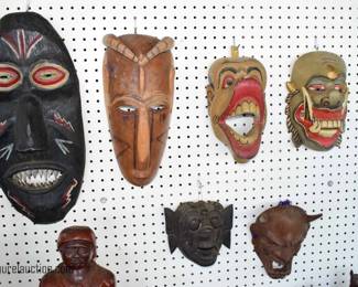 Collection of Carved Masks and Statues