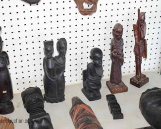 Collection of Carved Masks and Statues