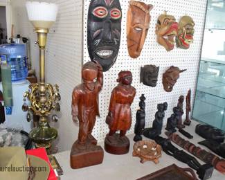 Collection of Carved Masks and Statues