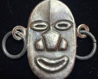 Africanthemed mask design pin in silver